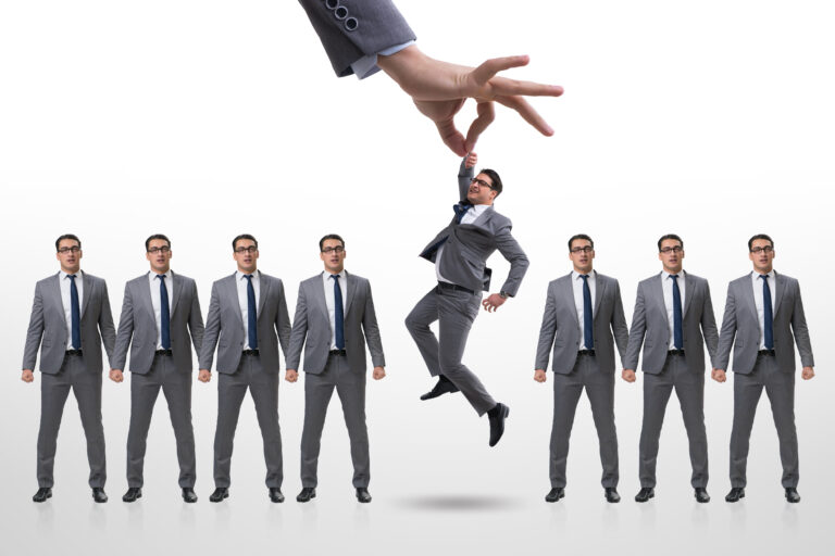 Recruitment concept with hand picking employee